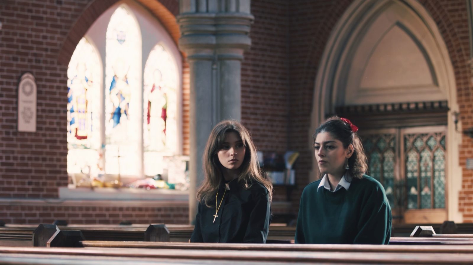 church-aisle wide, sunlit pews